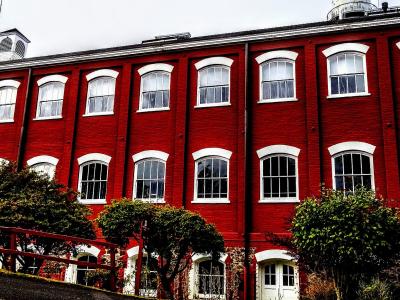 Red-painted historic woolen mill buildings at the Willamette Heritage Center in Salem